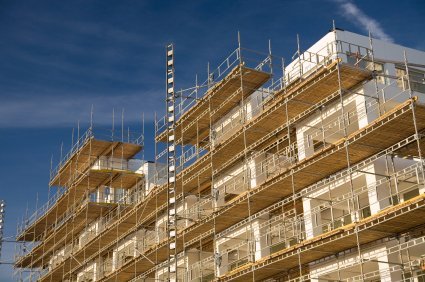 four tiers of scaffolding with wooden platform