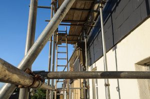 Scaffolding against a house wall